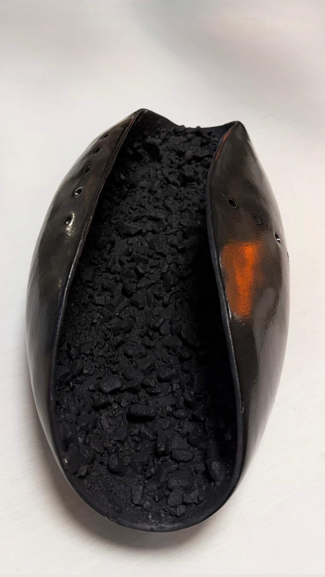 Split Seed, 2025, stoneware, by Ayse Nisa Akdemir